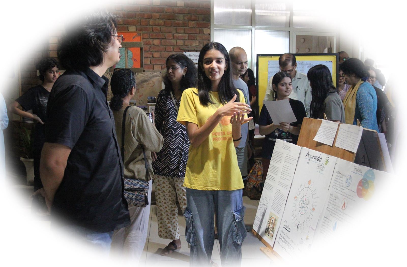 A learner presenting at the Grade 8 Renaissance exhibition