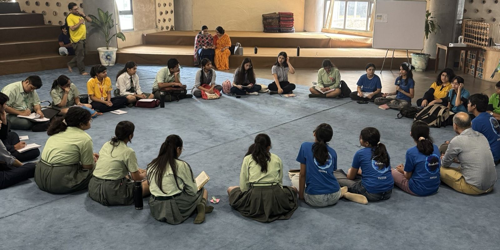 Learners from several schools seated in a circle for a Hocokah dialogue