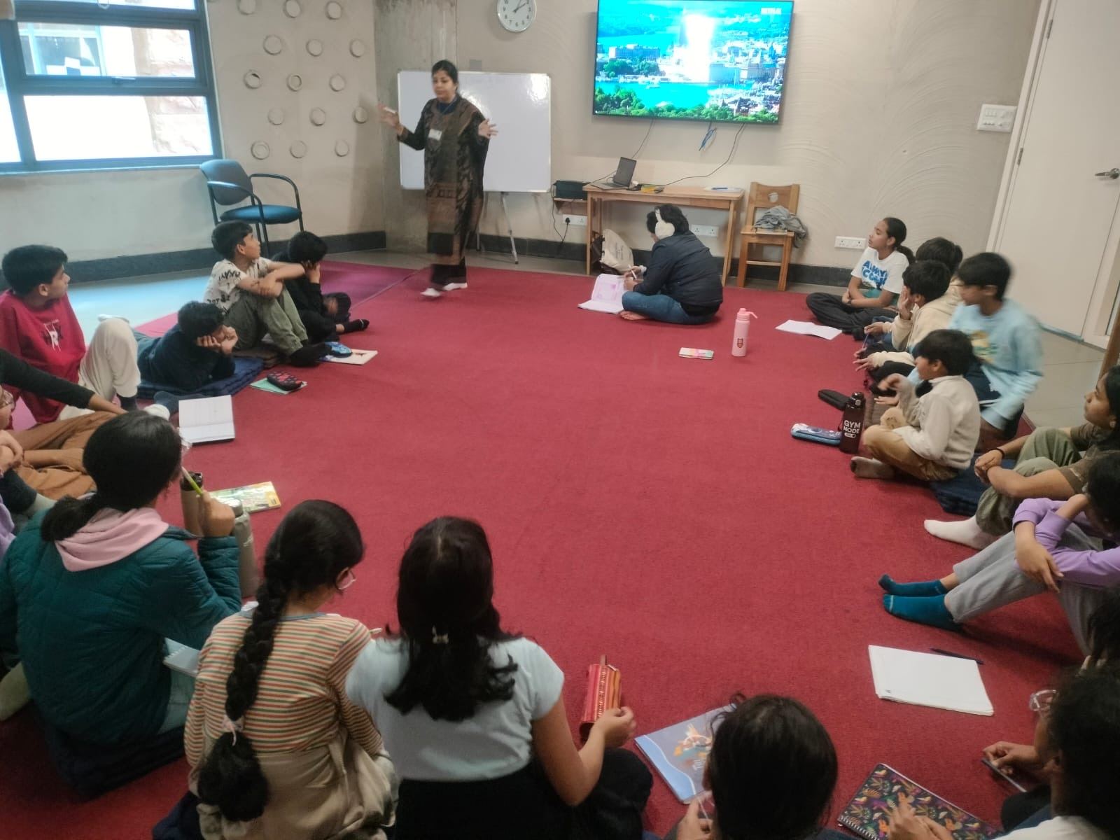 Learners seated on the floor in a Purpose Project session